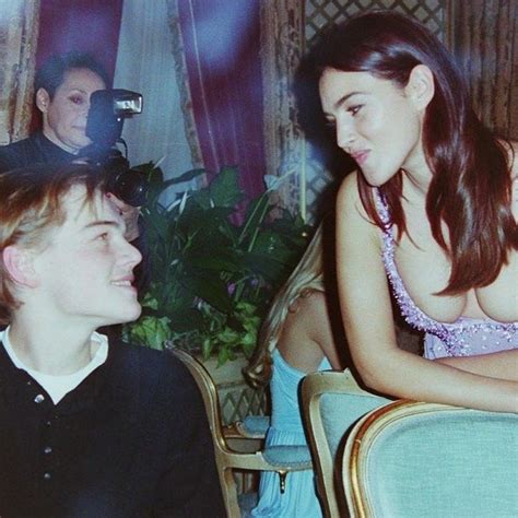 Leonardo DiCaprio and Monica Bellucci at a Versace dinner